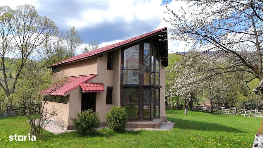 Casă cu 4 camere cu Teren 648 Mp în Moieciu