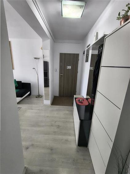 Apartament cu 2 camere decomandate balcon si loc de parcare etajul 1 - 13