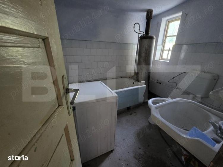 Casă cu 3 camere cu Teren 1820 Mp în Centură