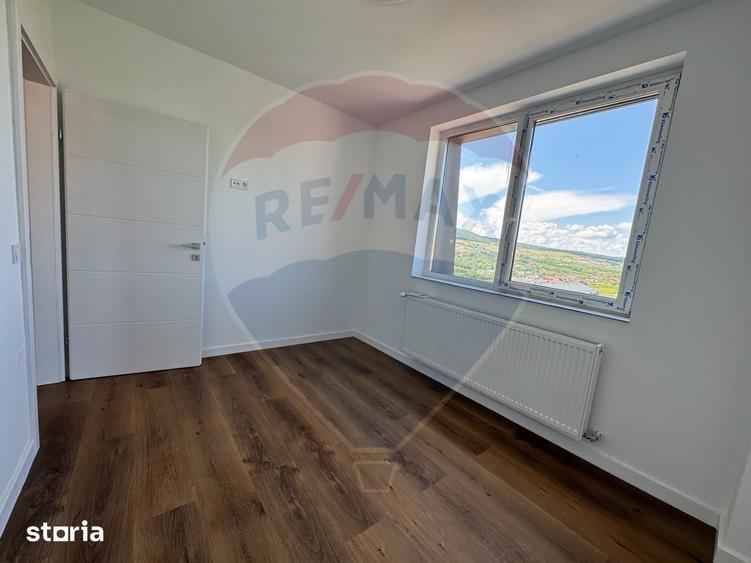 Apartament cu 2 camere semidecomandat în Chinteni