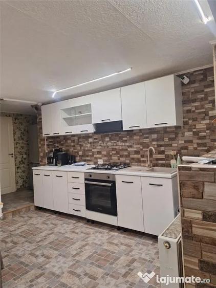 Casă cu 4 camere cu Teren 600 Mp în Comana