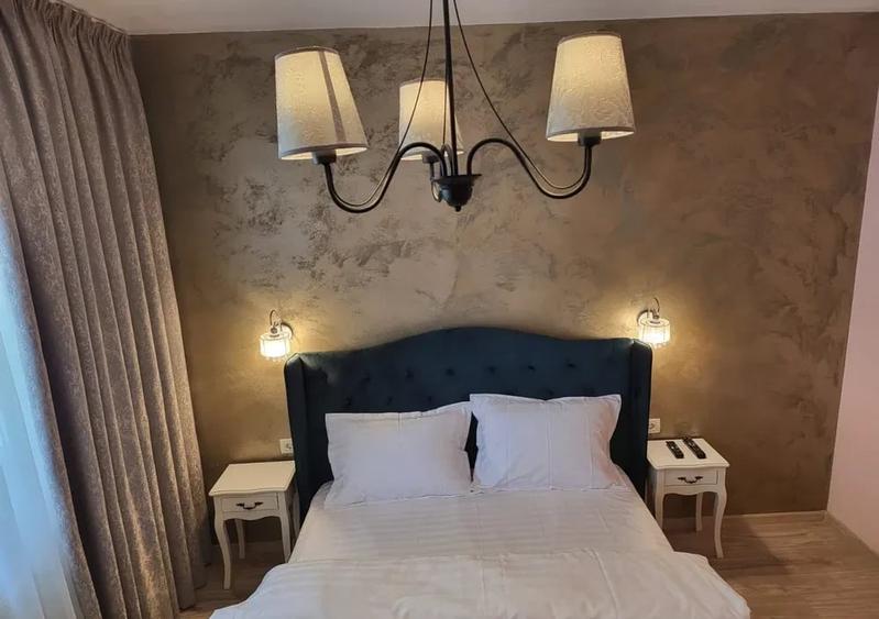 Apartament cu 2 camere semidecomandat, mobilat în Central
