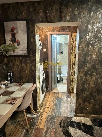 Apartament cu 3 camere decomandat în Podu Roș