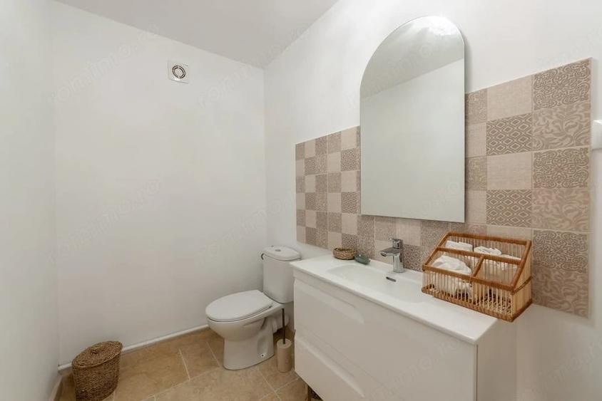 Casă cu Teren 1000 Mp în Est