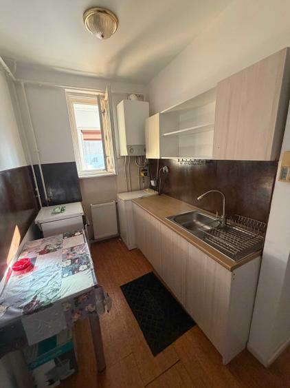 Garsonieră decomandată în Central