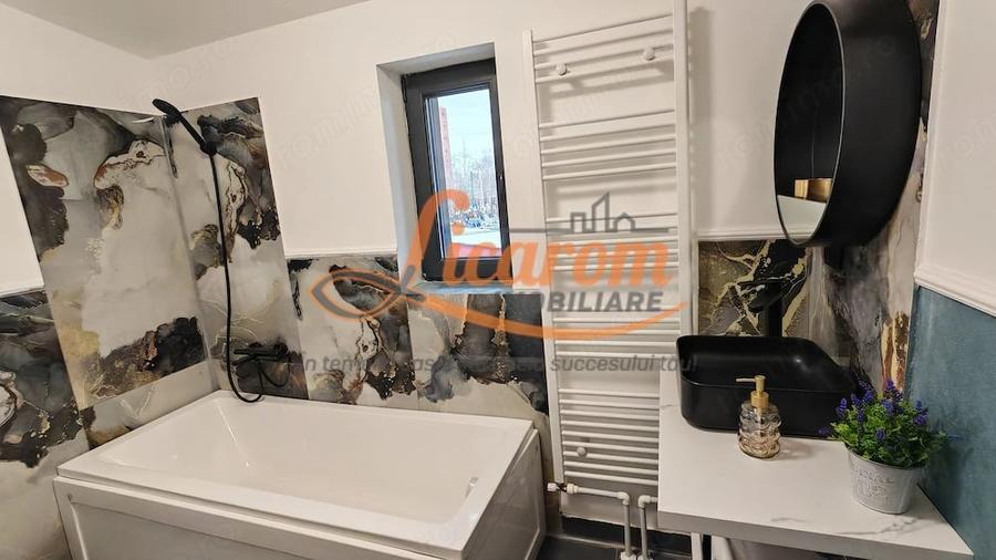 Apartament cu 4 camere decomandat în Răcădău