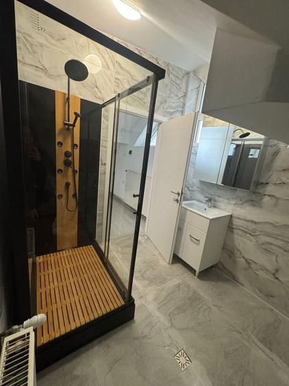 Casă cu 4 camere în Traian