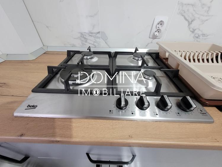 Apartament cu 2 camere semidecomandat, mobilat în Central