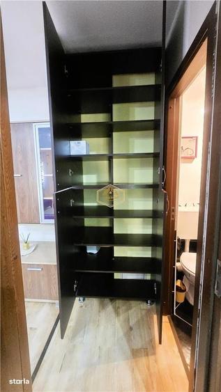 Apartament cu 2 camere semidecomandat, mobilat în Central
