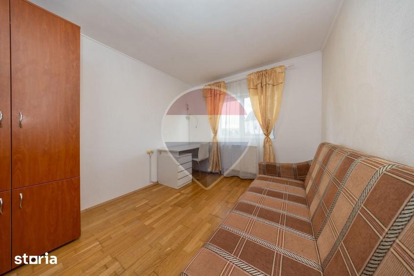 Apartament cu 3 camere decomandat în Tractorul