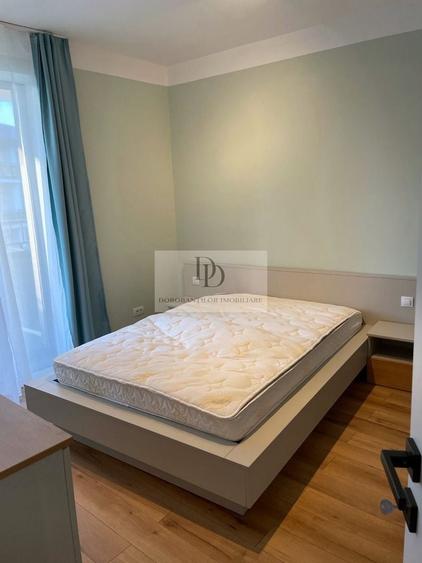 Penthouse cu 3 camere semidecomandat, mobilat în Central