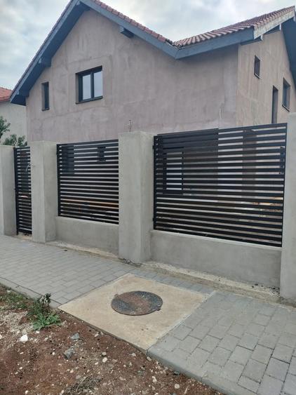 Casă cu 4 camere cu Teren 560 Mp în Giarmata