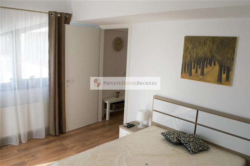 Apartament cu 3 camere semidecomandat, mobilat în Băneasa