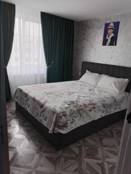 Apartament cu 3 camere decomandat în Titan