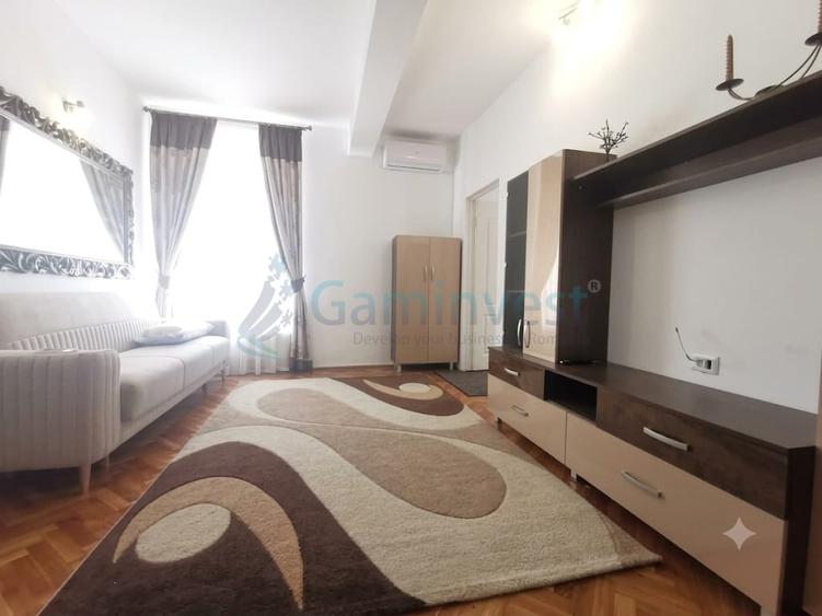 Apartament cu 2 camere semidecomandat, mobilat în Central