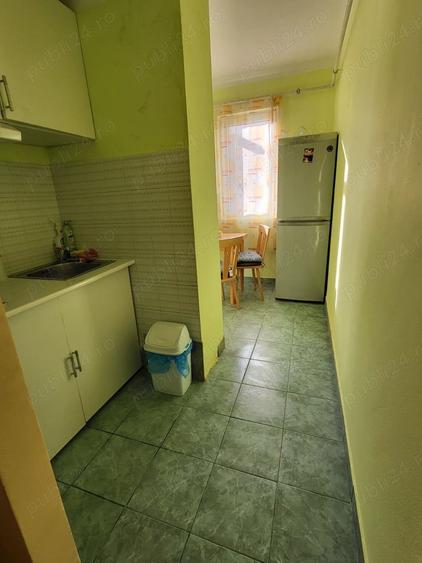 Apartament cu 3 camere semidecomandat în Baia Sprie