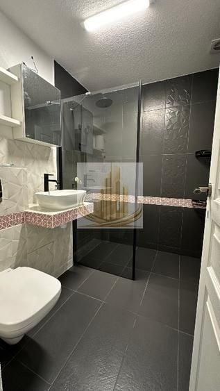 Apartament cu 2 camere semidecomandat, mobilat în Take Ionescu