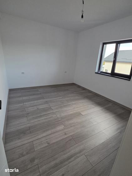 Casă cu 4 camere cu Teren 510 Mp în Holboca