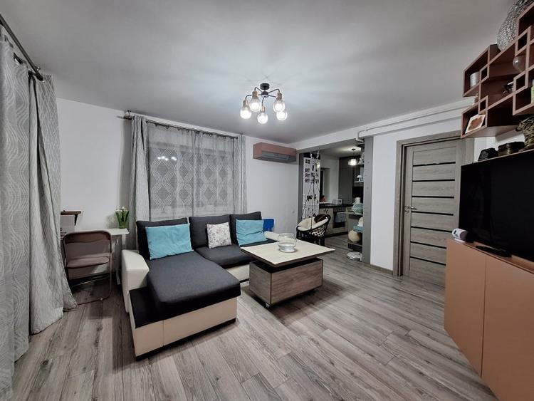 Apartament cu 3 camere semidecomandat, mobilat în Florești — fotografia 1
