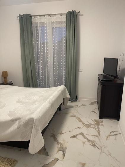 Apartament cu 2 camere decomandat în Sânmartin