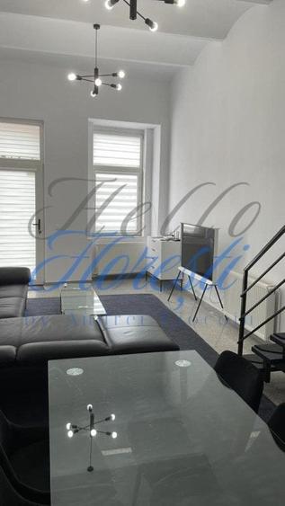 Apartament cu 2 camere semidecomandat, mobilat în Central