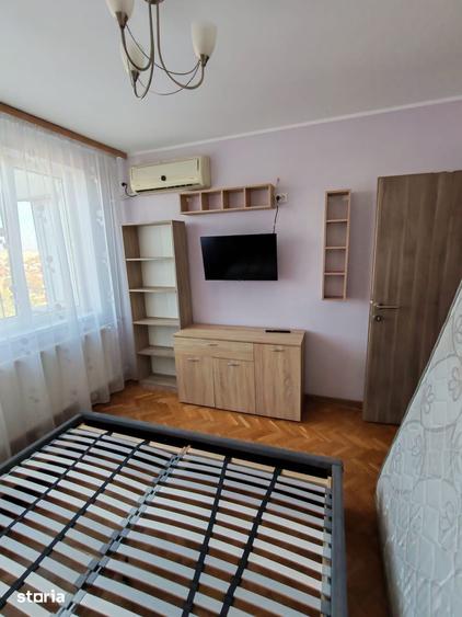 Apartament cu 3 camere semidecomandat, mobilat în Colentina