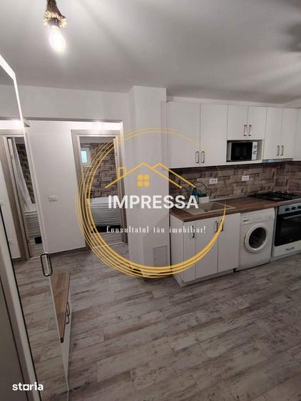 Se vinde apartament 2 camere decomandat langa scoala Miron Costin - 16