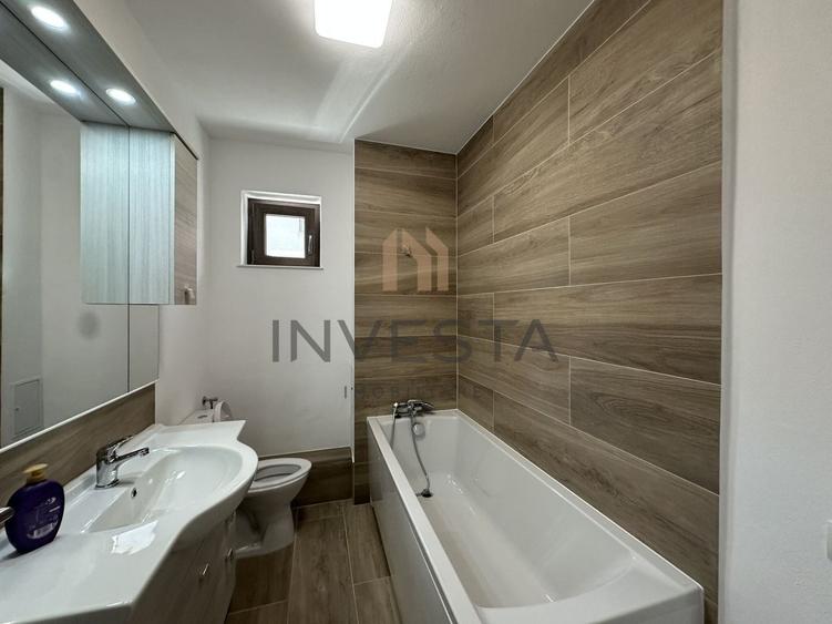 Apartament cu 3 camere semidecomandat, mobilat în Borhanci