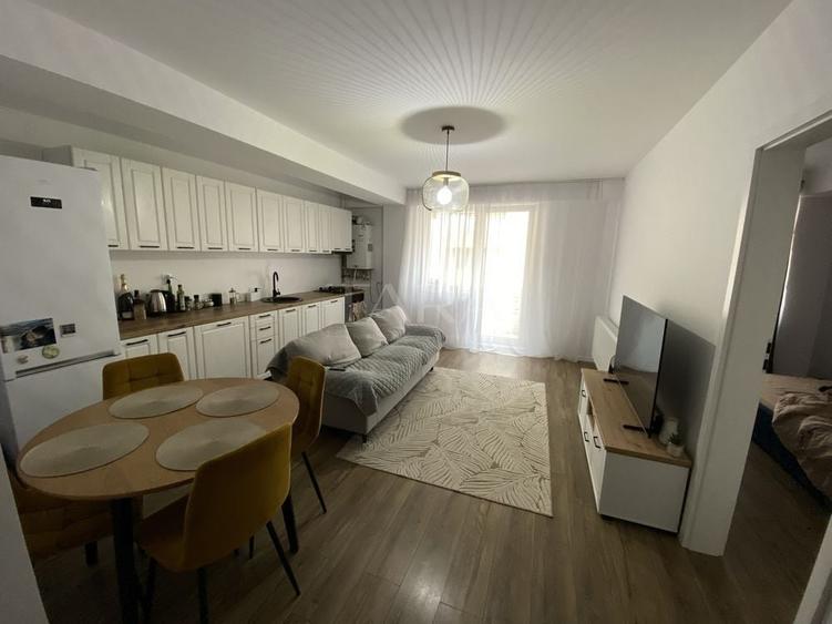 Apartament cu 2 camere semidecomandat, mobilat în Baciu
