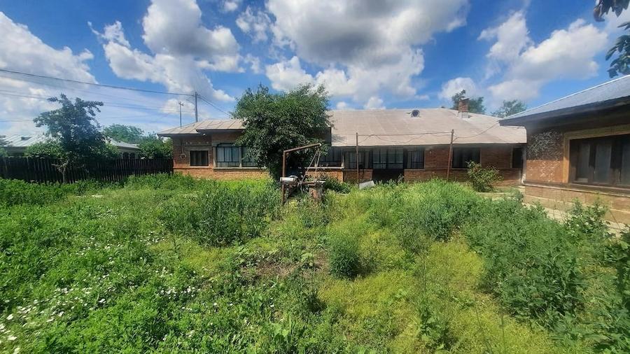 Casă cu 6 camere cu Teren 1500 Mp în Hulubești