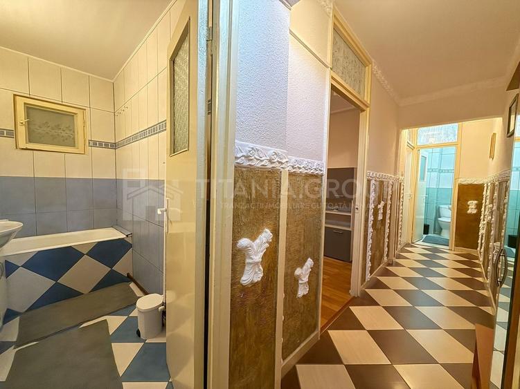 Apartament cu 2 camere, 2 bai, decomandat, etaj 1 - zona Racadau - 8