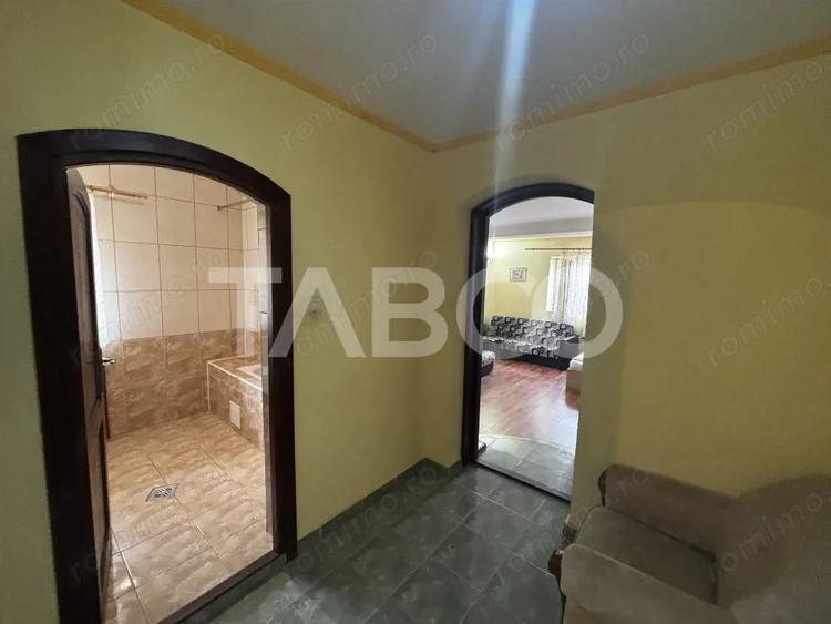 Casă cu 5 camere cu Teren 250 Mp în Cisnădioara