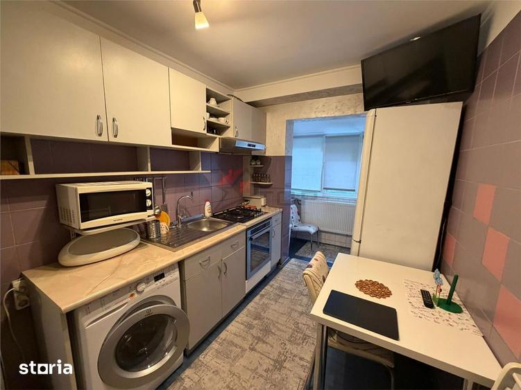 Apartament cu 2 camere semidecomandat în Podu Roș