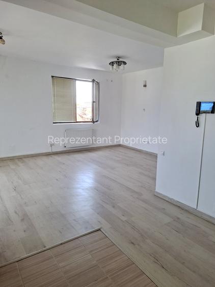 Studio cu vedere panoramică spre parc și loc de parcare în proprietate