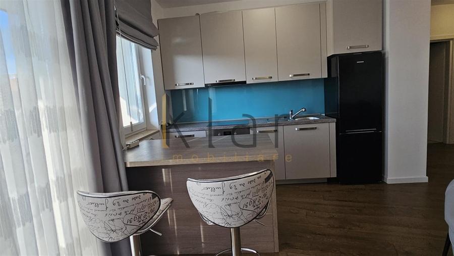 Apartament cu 2 camere semidecomandat, mobilat în Central