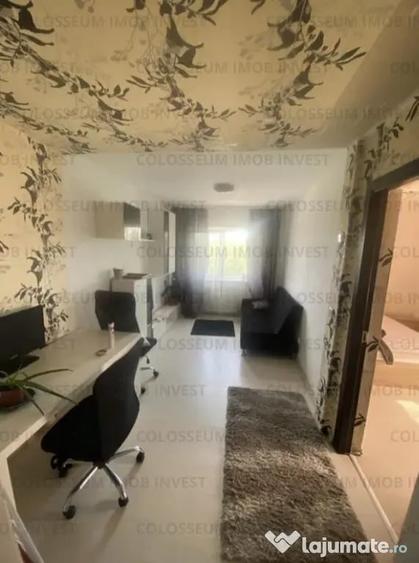 Apartament cu 4 camere decomandat în Tractorul