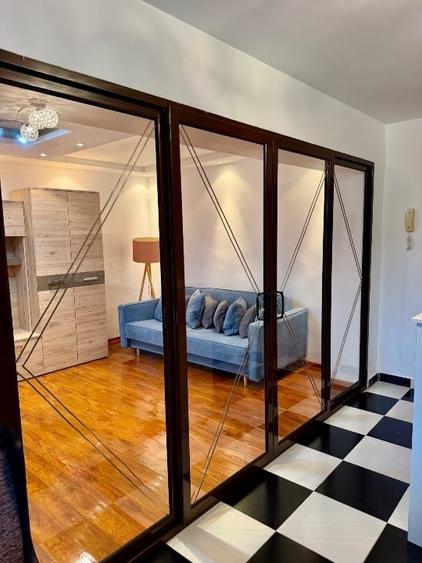 Apartament cu 2 camere decomandat, mobilat în Central