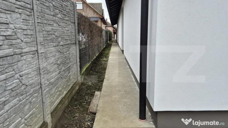 Casă cu 4 camere cu Teren 400 Mp în Vetiș