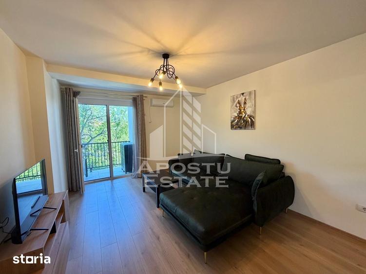 Apartament cu 2 camere, mobilat în Est
