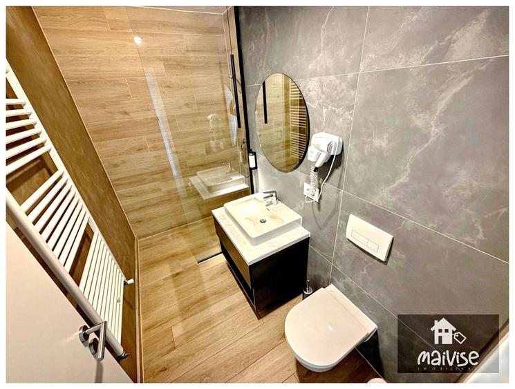 Apartament cu 2 camere decomandat, mobilat în Tractorul
