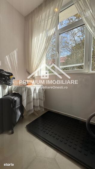 Apartament spa?ios cu 3 camere One?ti, zona centrala - 5