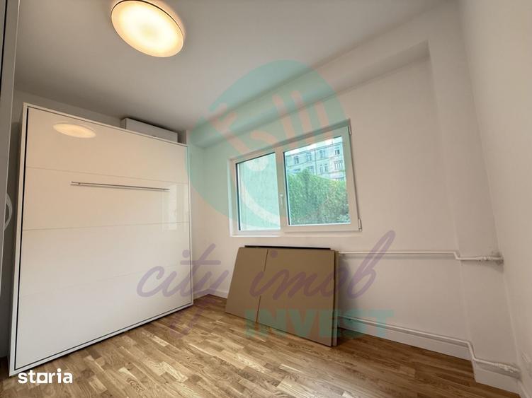 Apartament cu 4 camere decomandat în Romană