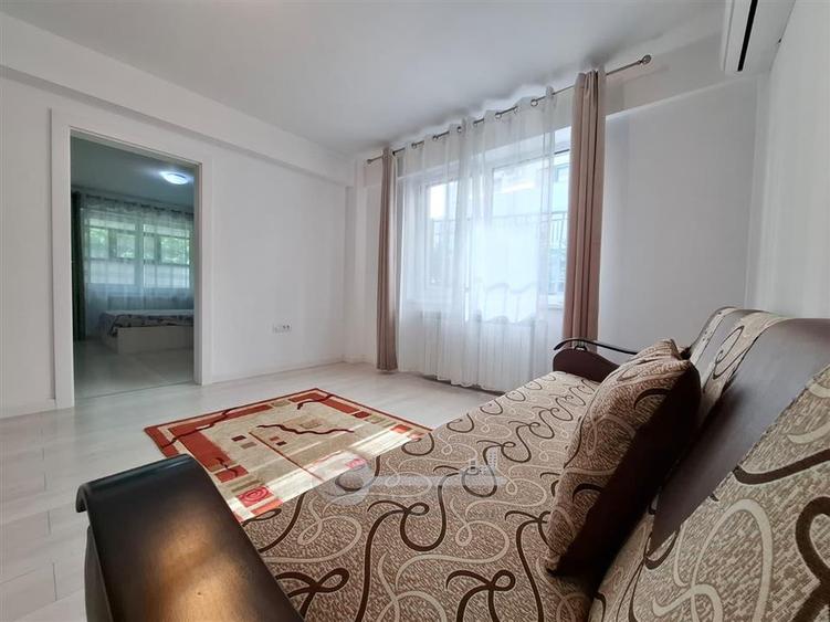 Apartament cu 2 camere semidecomandat, mobilat în Popas Păcurari