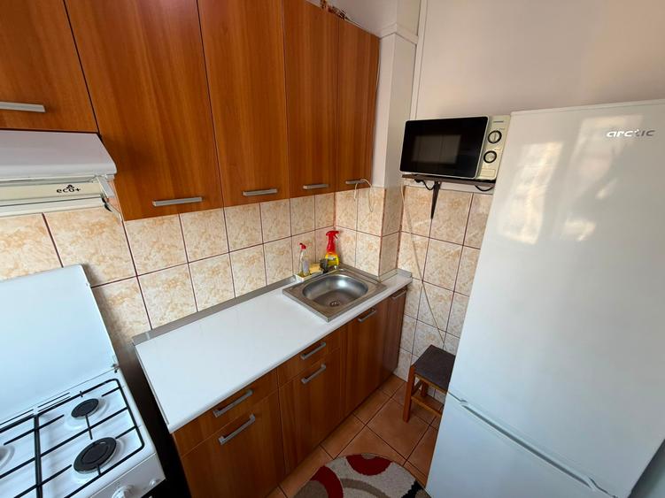 Garsonieră decomandată în Titan