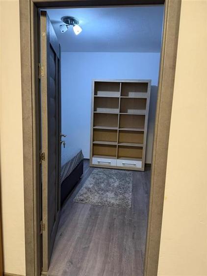 Apartament cu 2 camere semidecomandat, mobilat în Podu Roș
