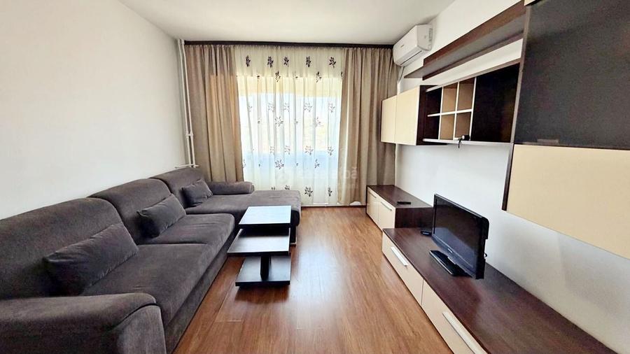 Apartament cu 2 camere semidecomandat, mobilat în Podul de Fier