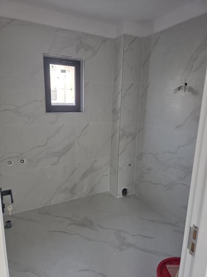 Casă cu 4 camere în Lumina