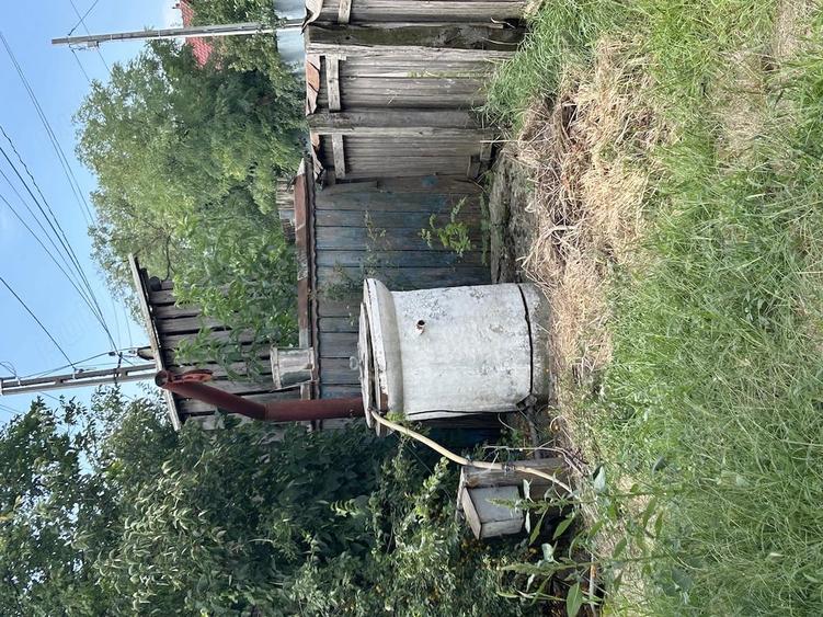 Casă cu Teren 1000 Mp în Central