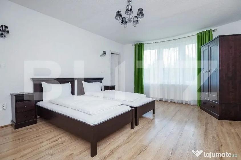 Casă cu 10 camere cu Teren 1100 Mp în Corunca