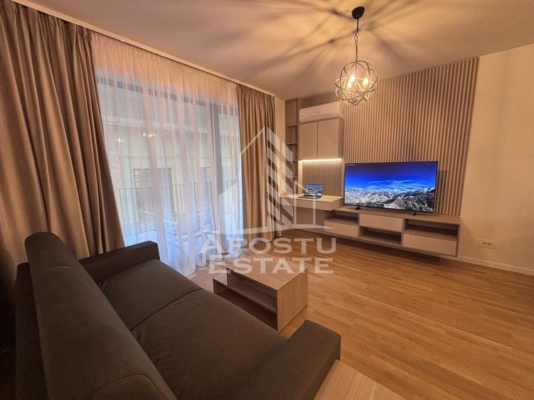 Apartament cu 2 camere semidecomandat, mobilat în Central